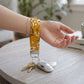 Mustard Botanical Floral Keychain Wristlet