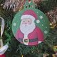 Green Santa Claus Snowfall Handpainted Wooden Christmas Ornament